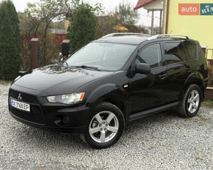 Черный Мицубиси Аутлендер, объемом двигателя 2.4 л и пробегом 184 тыс. км за 10800 $, фото 7 на Automoto.ua