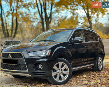 Черный Мицубиси Аутлендер, объемом двигателя 2.2 л и пробегом 226 тыс. км за 11500 $, фото 1 на Automoto.ua