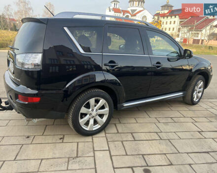 Черный Мицубиси Аутлендер, объемом двигателя 2.36 л и пробегом 244 тыс. км за 9850 $, фото 8 на Automoto.ua