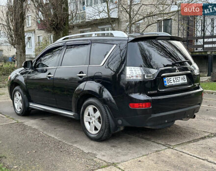 Чорний Міцубісі Аутлендер, об'ємом двигуна 2.36 л та пробігом 197 тис. км за 11300 $, фото 4 на Automoto.ua