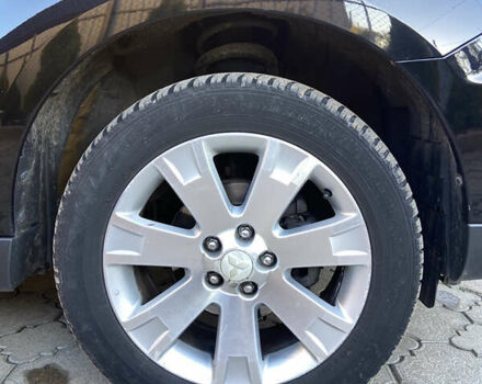 Черный Мицубиси Аутлендер, объемом двигателя 1.97 л и пробегом 292 тыс. км за 10900 $, фото 11 на Automoto.ua