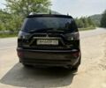 Черный Мицубиси Аутлендер, объемом двигателя 2.4 л и пробегом 275 тыс. км за 12000 $, фото 4 на Automoto.ua