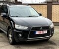 Черный Мицубиси Аутлендер, объемом двигателя 2 л и пробегом 300 тыс. км за 5500 $, фото 1 на Automoto.ua