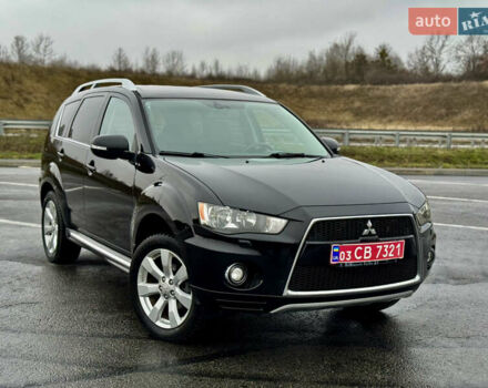 Чорний Міцубісі Аутлендер, об'ємом двигуна 2 л та пробігом 228 тис. км за 10550 $, фото 1 на Automoto.ua