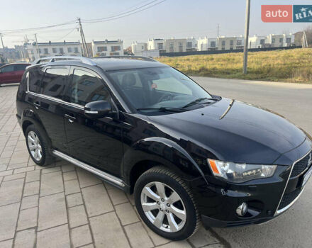 Черный Мицубиси Аутлендер, объемом двигателя 2.36 л и пробегом 244 тыс. км за 9850 $, фото 13 на Automoto.ua