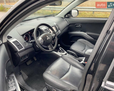 Черный Мицубиси Аутлендер, объемом двигателя 2.2 л и пробегом 227 тыс. км за 10700 $, фото 22 на Automoto.ua