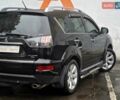 Черный Мицубиси Аутлендер, объемом двигателя 2.36 л и пробегом 107 тыс. км за 13990 $, фото 22 на Automoto.ua
