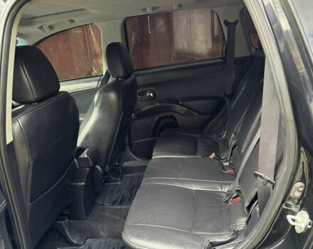 Чорний Міцубісі Аутлендер, об'ємом двигуна 2 л та пробігом 258 тис. км за 8699 $, фото 10 на Automoto.ua