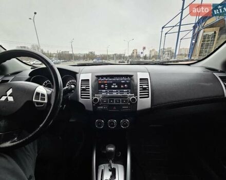 Чорний Міцубісі Аутлендер, об'ємом двигуна 2.4 л та пробігом 70 тис. км за 13000 $, фото 20 на Automoto.ua