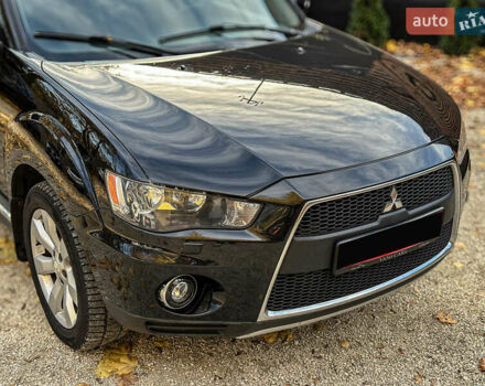 Черный Мицубиси Аутлендер, объемом двигателя 2.2 л и пробегом 226 тыс. км за 11500 $, фото 26 на Automoto.ua