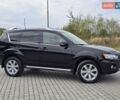 Мицубиси Аутлендер 2010 в Калуше на Automoto.ua Черный Мицубиси Аутлендер, объемом двигателя 1.97 л и пробегом 270 тыс. км за 11700 $, фото 7 на Automoto.ua