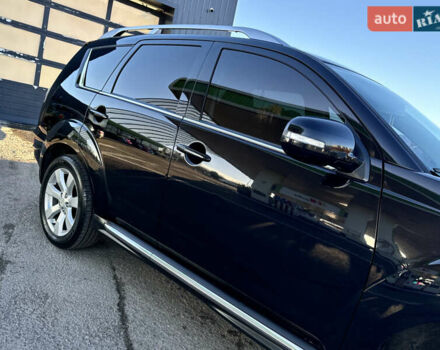 Черный Мицубиси Аутлендер, объемом двигателя 2.2 л и пробегом 263 тыс. км за 11300 $, фото 7 на Automoto.ua