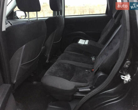 Черный Мицубиси Аутлендер, объемом двигателя 2.36 л и пробегом 315 тыс. км за 9700 $, фото 14 на Automoto.ua