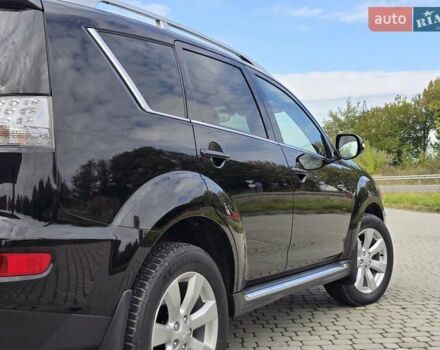 Мицубиси Аутлендер 2010 в Калуше на Automoto.ua Черный Мицубиси Аутлендер, объемом двигателя 1.97 л и пробегом 270 тыс. км за 11700 $, фото 14 на Automoto.ua