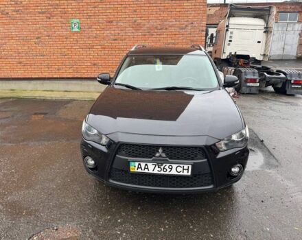 Черный Мицубиси Аутлендер, объемом двигателя 2.4 л и пробегом 305 тыс. км за 10000 $, фото 4 на Automoto.ua