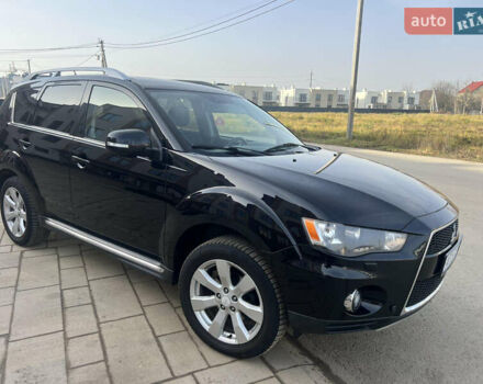 Черный Мицубиси Аутлендер, объемом двигателя 2.36 л и пробегом 244 тыс. км за 9850 $, фото 6 на Automoto.ua