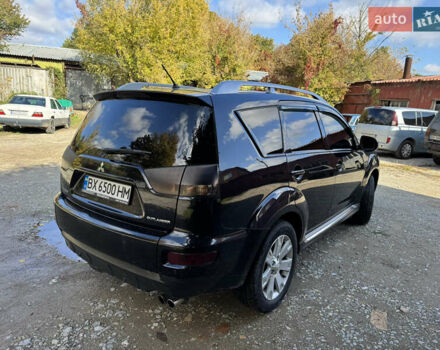 Чорний Міцубісі Аутлендер, об'ємом двигуна 2 л та пробігом 258 тис. км за 8699 $, фото 5 на Automoto.ua