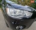 Мицубиси Аутлендер 2010 в Чернигове на Automoto.ua Черный Мицубиси Аутлендер, объемом двигателя 2.4 л и пробегом 180 тыс. км за 11500 $, фото 3 на Automoto.ua