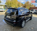 Чорний Міцубісі Аутлендер, об'ємом двигуна 2 л та пробігом 258 тис. км за 8699 $, фото 5 на Automoto.ua