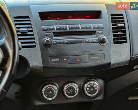 Черный Мицубиси Аутлендер, объемом двигателя 2.2 л и пробегом 226 тыс. км за 11500 $, фото 88 на Automoto.ua