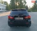 Черный Мицубиси Аутлендер, объемом двигателя 2 л и пробегом 238 тыс. км за 10200 $, фото 4 на Automoto.ua