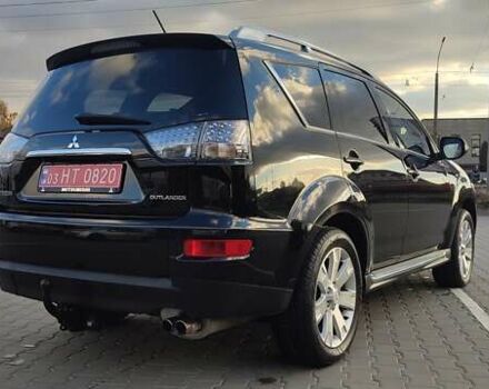 Черный Мицубиси Аутлендер, объемом двигателя 2 л и пробегом 210 тыс. км за 10600 $, фото 6 на Automoto.ua