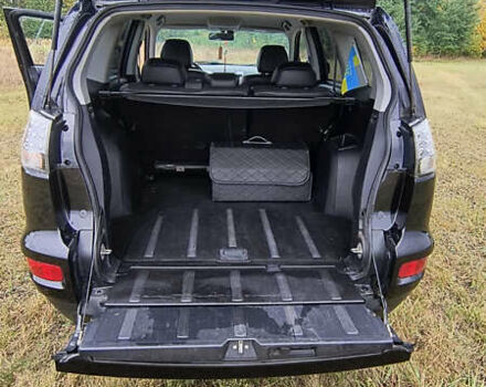 Черный Мицубиси Аутлендер, объемом двигателя 2.27 л и пробегом 238 тыс. км за 11500 $, фото 7 на Automoto.ua