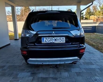 Черный Мицубиси Аутлендер, объемом двигателя 2 л и пробегом 264 тыс. км за 2900 $, фото 4 на Automoto.ua