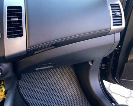 Черный Мицубиси Аутлендер, объемом двигателя 1.97 л и пробегом 292 тыс. км за 10900 $, фото 26 на Automoto.ua