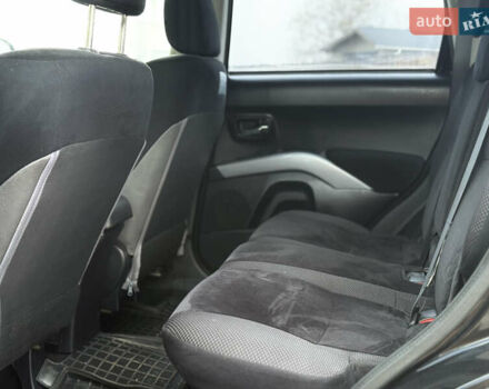 Черный Мицубиси Аутлендер, объемом двигателя 2.4 л и пробегом 184 тыс. км за 10800 $, фото 6 на Automoto.ua