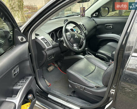 Чорний Міцубісі Аутлендер, об'ємом двигуна 2.36 л та пробігом 197 тис. км за 11300 $, фото 11 на Automoto.ua