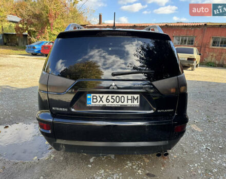 Чорний Міцубісі Аутлендер, об'ємом двигуна 2 л та пробігом 258 тис. км за 8699 $, фото 6 на Automoto.ua