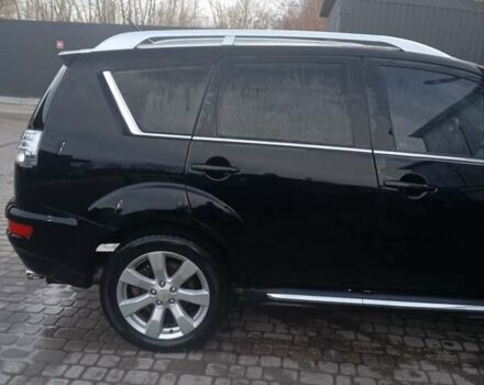 Черный Мицубиси Аутлендер, объемом двигателя 2.2 л и пробегом 264 тыс. км за 10700 $, фото 5 на Automoto.ua