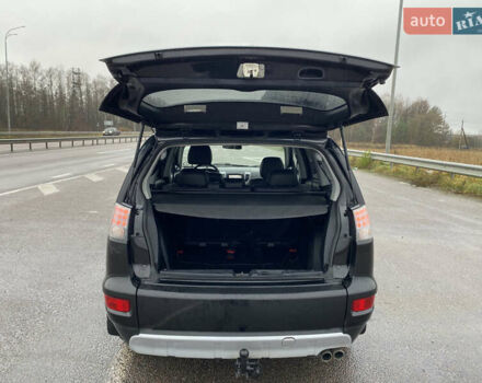 Черный Мицубиси Аутлендер, объемом двигателя 2.2 л и пробегом 227 тыс. км за 10700 $, фото 40 на Automoto.ua