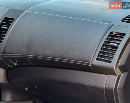 Черный Мицубиси Аутлендер, объемом двигателя 2.2 л и пробегом 226 тыс. км за 11500 $, фото 103 на Automoto.ua