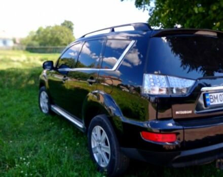 Черный Мицубиси Аутлендер, объемом двигателя 2.2 л и пробегом 190 тыс. км за 11999 $, фото 4 на Automoto.ua