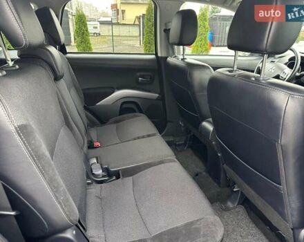 Черный Мицубиси Аутлендер, объемом двигателя 2.2 л и пробегом 226 тыс. км за 10750 $, фото 11 на Automoto.ua