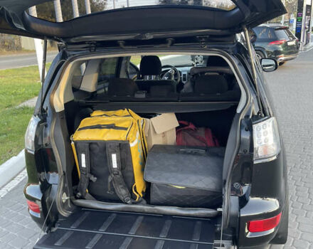 Чорний Міцубісі Аутлендер, об'ємом двигуна 2.4 л та пробігом 93 тис. км за 12500 $, фото 20 на Automoto.ua