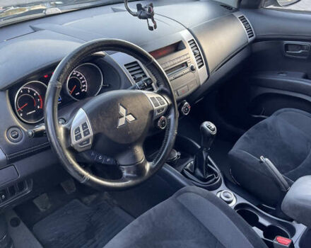 Чорний Міцубісі Аутлендер, об'ємом двигуна 2.4 л та пробігом 93 тис. км за 12500 $, фото 12 на Automoto.ua