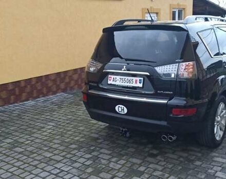 Черный Мицубиси Аутлендер, объемом двигателя 2.2 л и пробегом 209 тыс. км за 12700 $, фото 8 на Automoto.ua