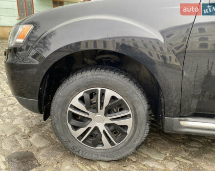 Черный Мицубиси Аутлендер, объемом двигателя 2.27 л и пробегом 233 тыс. км за 10500 $, фото 14 на Automoto.ua