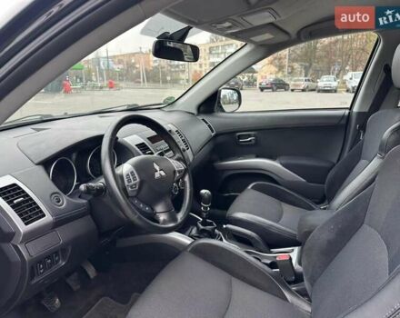 Черный Мицубиси Аутлендер, объемом двигателя 2.2 л и пробегом 226 тыс. км за 10750 $, фото 34 на Automoto.ua