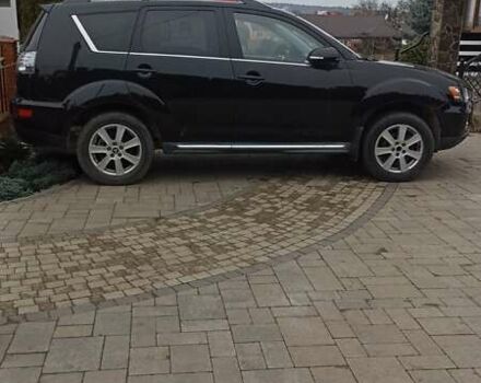 Черный Мицубиси Аутлендер, объемом двигателя 2 л и пробегом 196 тыс. км за 9900 $, фото 21 на Automoto.ua