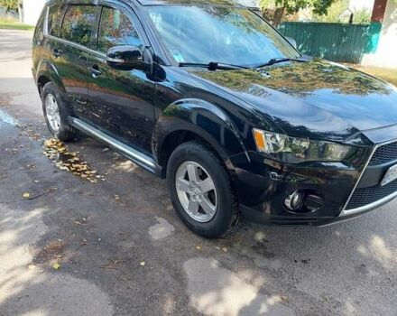 Чорний Міцубісі Аутлендер, об'ємом двигуна 2.3 л та пробігом 271 тис. км за 10500 $, фото 6 на Automoto.ua