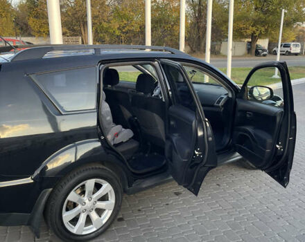 Чорний Міцубісі Аутлендер, об'ємом двигуна 2.4 л та пробігом 93 тис. км за 12500 $, фото 23 на Automoto.ua