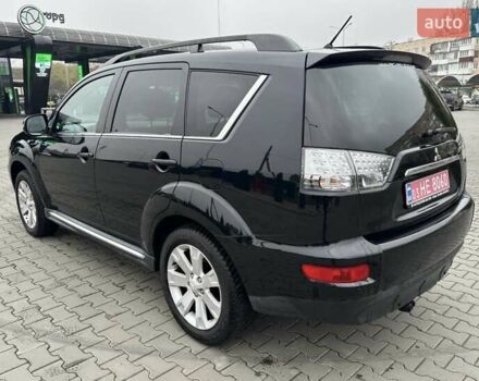 Черный Мицубиси Аутлендер, объемом двигателя 2.2 л и пробегом 226 тыс. км за 10750 $, фото 15 на Automoto.ua