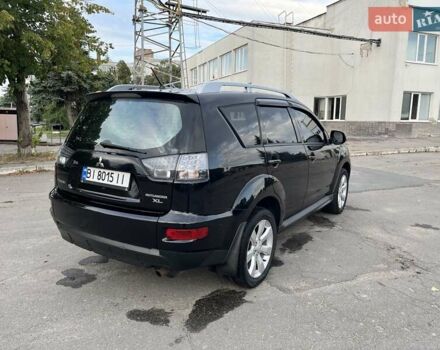 Чорний Міцубісі Аутлендер, об'ємом двигуна 2.4 л та пробігом 177 тис. км за 11900 $, фото 7 на Automoto.ua