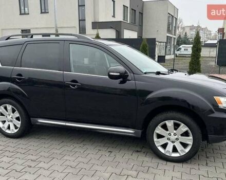 Черный Мицубиси Аутлендер, объемом двигателя 2.2 л и пробегом 226 тыс. км за 10750 $, фото 27 на Automoto.ua