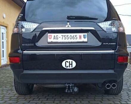 Черный Мицубиси Аутлендер, объемом двигателя 2.2 л и пробегом 209 тыс. км за 12700 $, фото 48 на Automoto.ua