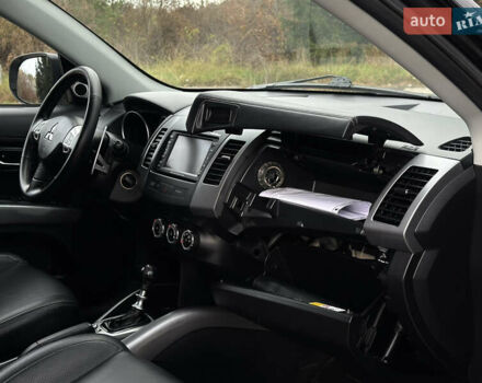 Чорний Міцубісі Аутлендер, об'ємом двигуна 2.2 л та пробігом 236 тис. км за 11399 $, фото 55 на Automoto.ua